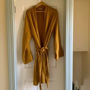 Parachute cloud cotton robe in amber. A few lose threads, pictured. Gently used.